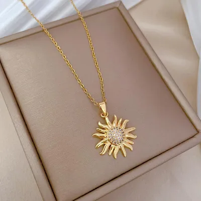 Produktbild von Goldene Halskette mit Sonnenblumenanhänger