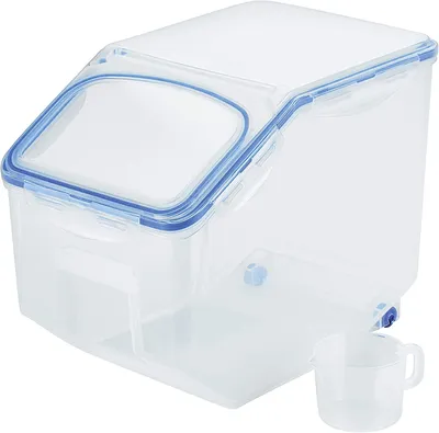 A clear, studio shot of a transparent plastic kitchen caddy with blue locking mechanisms and a small measuring cup.