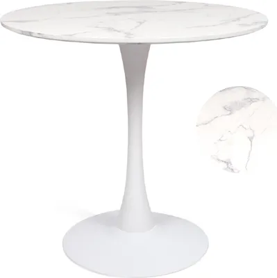 A white tulip-style dining table with a marble-look top.