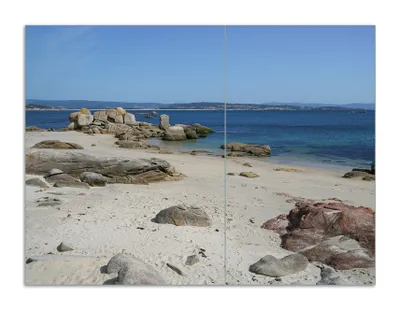 Produktbild von Wallario Herdabdeckplatte aus Glas, Größe 70 x 52 cm 2-teilig, Motiv Felsen auf einem Sandstrand