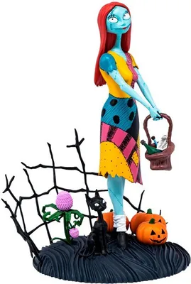 A collectible figure of Sally from The Nightmare Before Christmas, standing on a themed base with pumpkins, a black cat, and a plant.