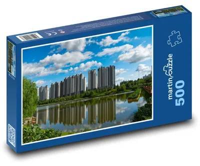 Produktbild von martinpuzzle - Puzzle 500 Teile - Hochhäuser am Fluss