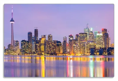 Produktbild von Wallario Frühstücksbrettchen aus Glas 20 x 30 cm mit rutschfesten Füßen, Motiv Toronto Skyline - Kanada am Abend