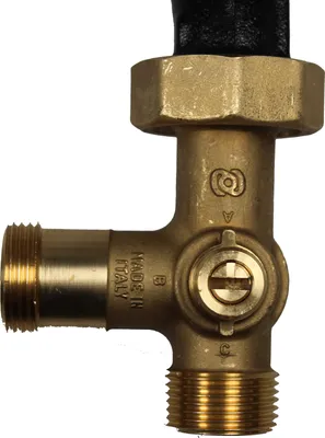 Close-up of a brass plumbing valve with threaded connections and a black handle or cap.