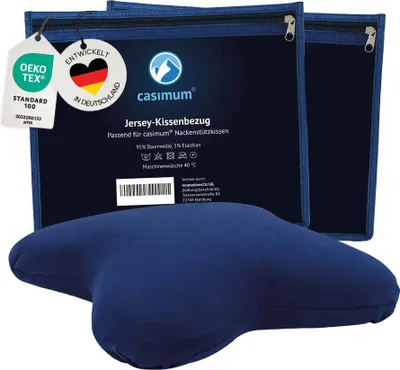 Two blue pillowcases in their packaging, with a blue pillow in the foreground.
