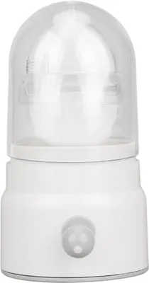 A white egg spinner device with a clear dome.