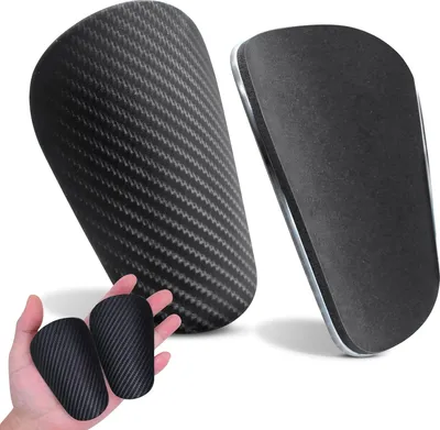 Produktbild von Leichte Fußball-Schienbeinschoner für Herren, Damen und Kinder - Ergonomisch und Kompakt - Mini 10x6,3 cm