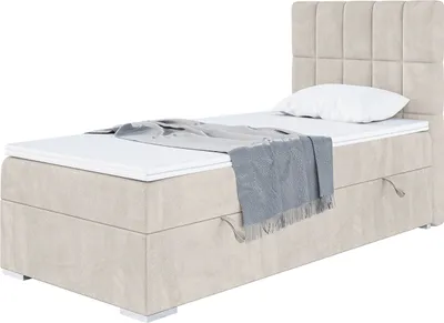 A single bed with a headboard, mattress, and topper, displayed against a white background.