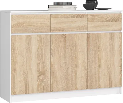 Produktbild von Kommode AKORD K140 Weiß 138 cm 3 Türen 3 Schubladen 6 Ebenen Front Sonoma-Eiche B138 x H99 x T40 cm