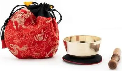 Image de Petit bol chantant au son clair, dans un sac rouge