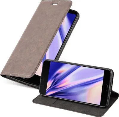 A brown flip-style phone case is shown with a smartphone inside. The phone is lying horizontally in the foreground, and the case is partially open, covering the top portion of the phone.