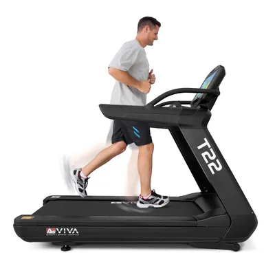 A man is running on a treadmill.