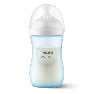 A Philips Avent baby bottle filled with milk, shown against a white background.