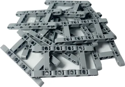 A pile of gray LEGO Technic liftarms on a white background.