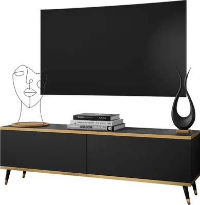 A black and gold TV stand with a large black television mounted above it.