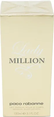 A close-up of a gold-colored box for Paco Rabanne Lady Million Sensual Body Lotion.