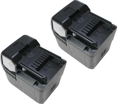 Two black lithium-ion batteries are shown from a slightly elevated angle against a white background.