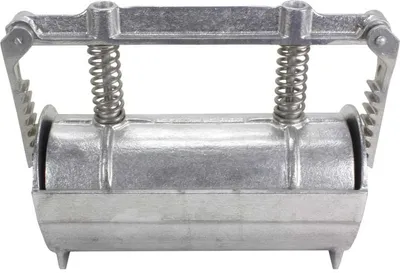 A close-up, front-facing studio shot of a silver meat press for making homemade ham.