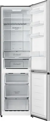 An open refrigerator with empty shelves and drawers.
