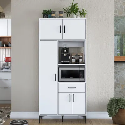 A white multi-purpose cabinet with appliances and decor.