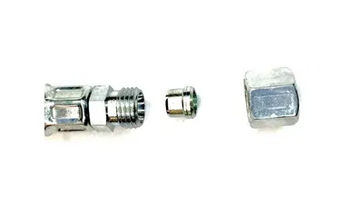 A close-up shot of three metal plumbing fittings on a white background.