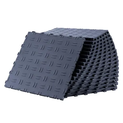 A stack of interlocking garage floor tiles.
