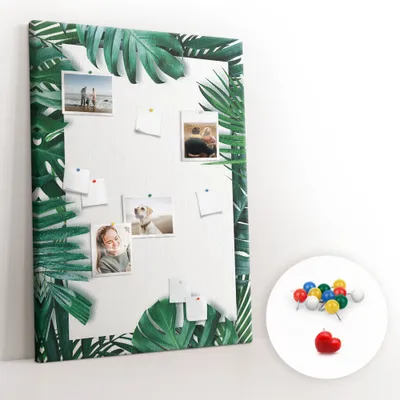 Imagen del producto de Tablero de corcho con chinchetas - Tablero con chinchetas para fotografías y notas - 100x140 cm - 100 chinchetas de colores - Marco con diseño de Monstera