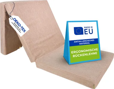 A folded mattress with informational tags and a stand-up sign.
