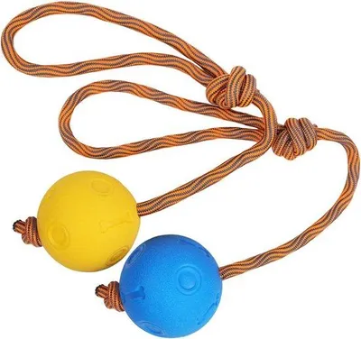 Immagine prodotto di Due palline morbide in gomma con cordino, blu e gialle, 5 cm