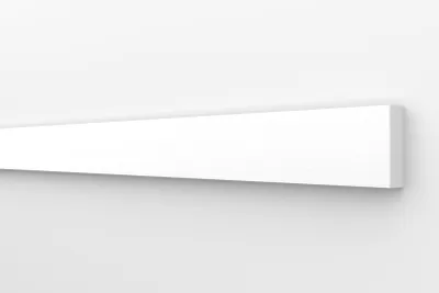 A white molding strip is shown against a white wall.