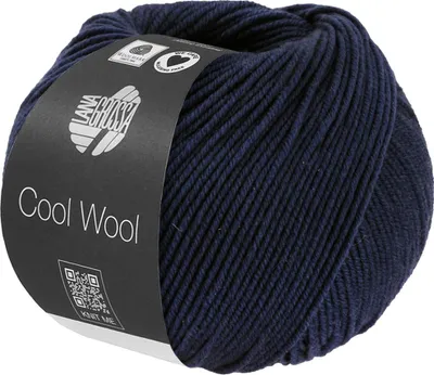 A ball of dark blue yarn with a label.