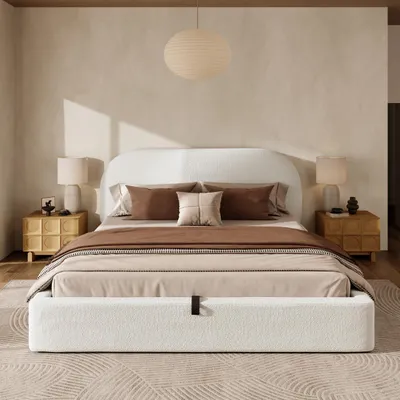 A bedroom scene featuring a bed with bedding and nightstands.