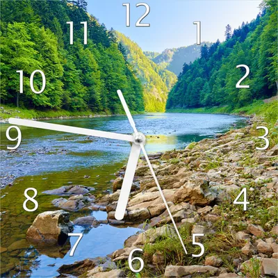 Produktbild von Wallario Design Wanduhr Fluss in den Bergen an steinigem Ufer aus Echtglas, Größe 20 x 20 cm