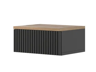 A floating nightstand with a fluted front and a wood-effect top, isolated on a white background.