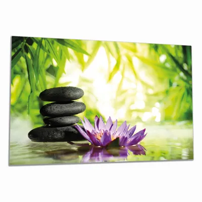 Produktbild von Wallario Herdabdeckplatte aus Glas, Größe 80 x 52 cm 1-teilig, Motiv Steinstapel in schwarz mit Blumenblüte in lila