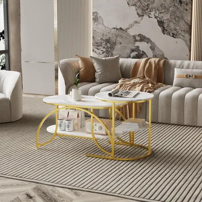 A modern living room with a sofa, armchair, and a coffee table set.
