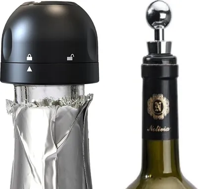 Two bottle stoppers are shown, one on a bottle and one on a bottle with foil.