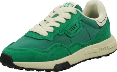 A single green sneaker is shown from a side-angle against a white background.
