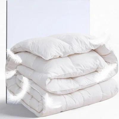 Produktbild von Ganzjahresdaunenbett 135x200 warm aus Baumwolle gesteppt mit Daunenfedern