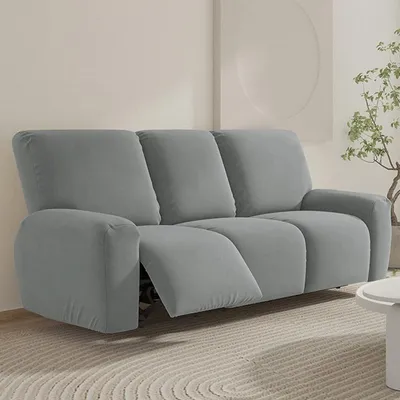 Image de Housses de fauteuil extensibles avec poches - Protection de meuble 3 places pour salon gris