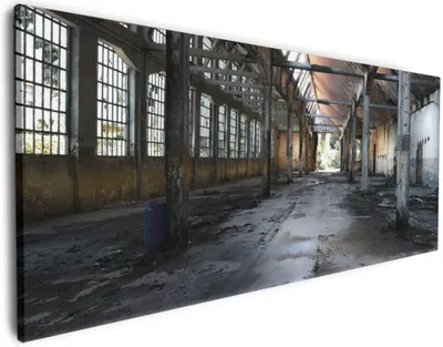 Produktbild von Wallario Premium Leinwandbild Alte Industriehalle  leerstehend und einsam in Größe 50 x 125 cm
