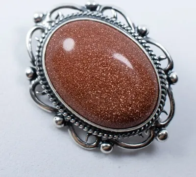 Produktbild von Silberne Brosche Glare 18