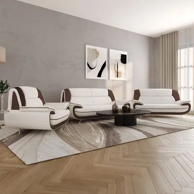 A living room scene with a sofa set, coffee table, and artwork on the wall.