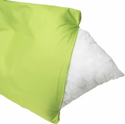 A lime green pillowcase with a white pillow partially inserted.