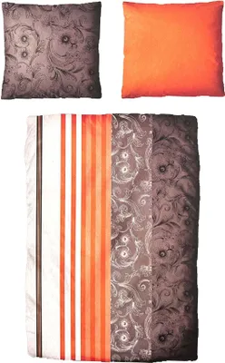 Three pillows and a folded duvet cover are arranged on a white background.