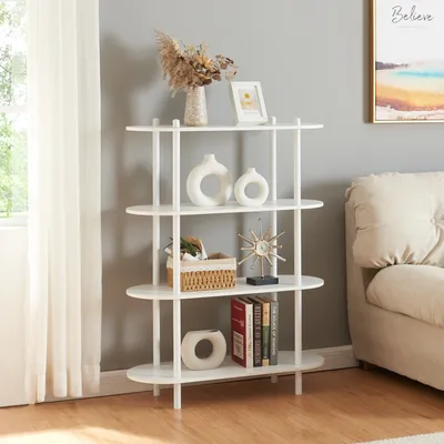 A white bookshelf with decorative items is placed in a room next to a sofa and a window with white curtains.
