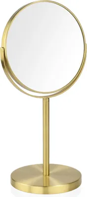 A gold-colored double-sided magnifying mirror on a stand.