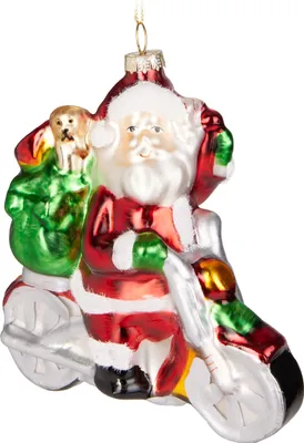 A glass Christmas ornament of Santa Claus riding a motorcycle.