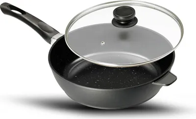 A black frying pan with a glass lid is shown against a white background.