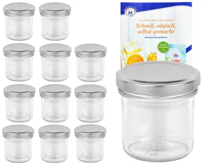 A set of glass jars with silver lids, along with a recipe booklet.